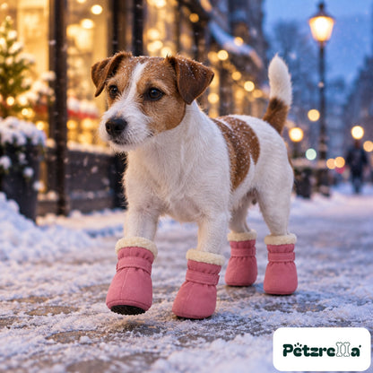 Petzrella Winter Snow Boots for Dogs - Pink, worn by a jack russell on a snowy city pavement