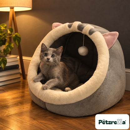 Petzrella Cosy Cat Cave Bed with a grey cat looking out of the opening
