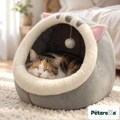 Petzrella Cosy Cat Cave Bed with a calico cat asleep inside