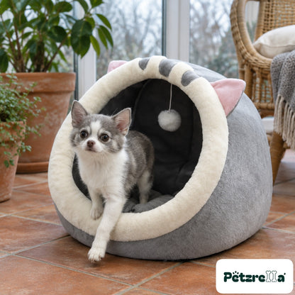 Petzrella Cosy Cat Cave Bed with a small pet stepping out of it