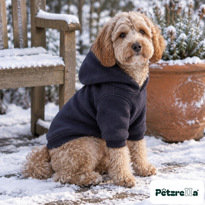 Petzrella Fleece Dog Hoodie in navy on a poodle mix on a snowy terrace
