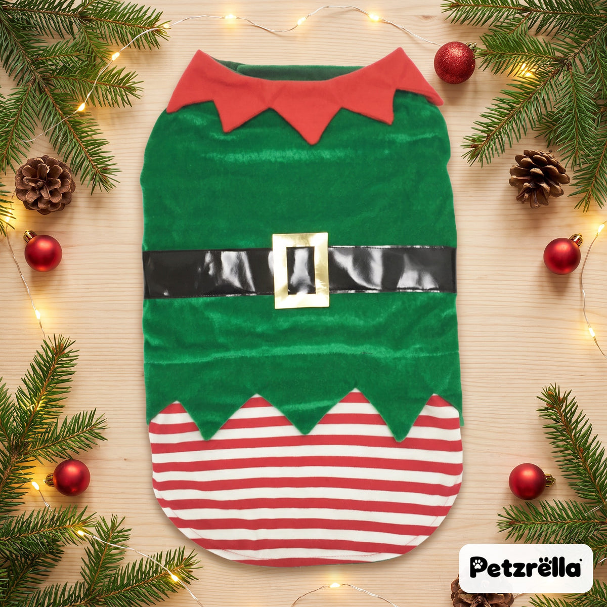Petzrella green Christmas elf pet costume laid flat with fir branches and baubles