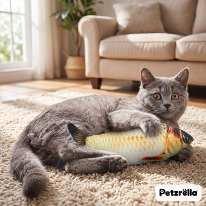 Grey cat hugging the Petzrella golden carp flopping fish toy on a rug at home