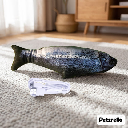 Petzrella trout flopping fish cat toy with USB charging cable on a grey rug