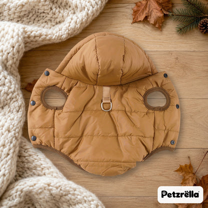 Petzrella Arctic Shield Puffer Jacket in brown on a wooden floor with a knit blanket